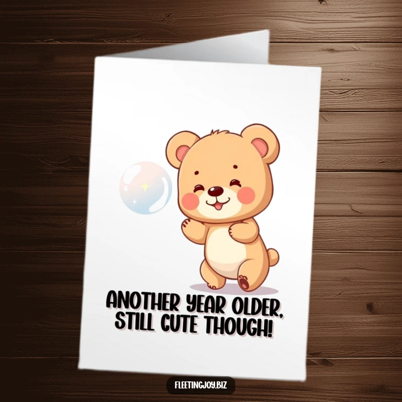 Funny Free Printable Birthday Card: Adorable bear cub joyfully chasing a shimmering bubble, perfect for a playful celebration.