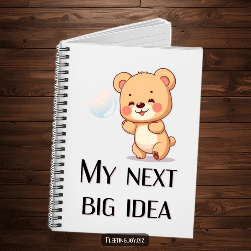 Funny Bear Cub Notebook showing a small bear cub happily chasing a shiny bubble, perfect for notes and creative thoughts.